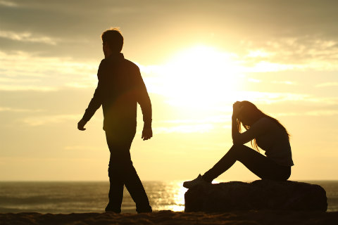 couple breaking up man walking away