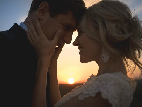 Couple in love at sunset.