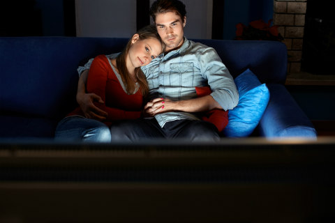 woman watching a movie with her ex